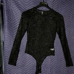 Worn once; women’s lace bodysuit